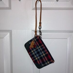 Coach wristlet in navy and red plaid.